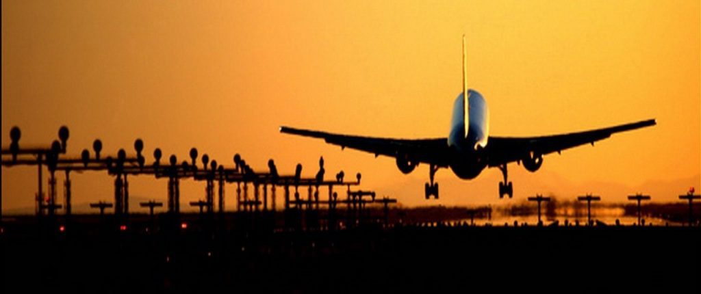 England Castle Vacations - Plane at Sunset