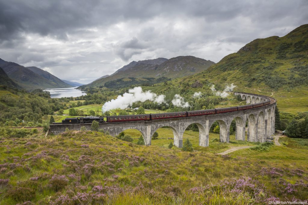 Scotland Group Tours - Jacobite steam train passing over the Glenfinnan Viaduct